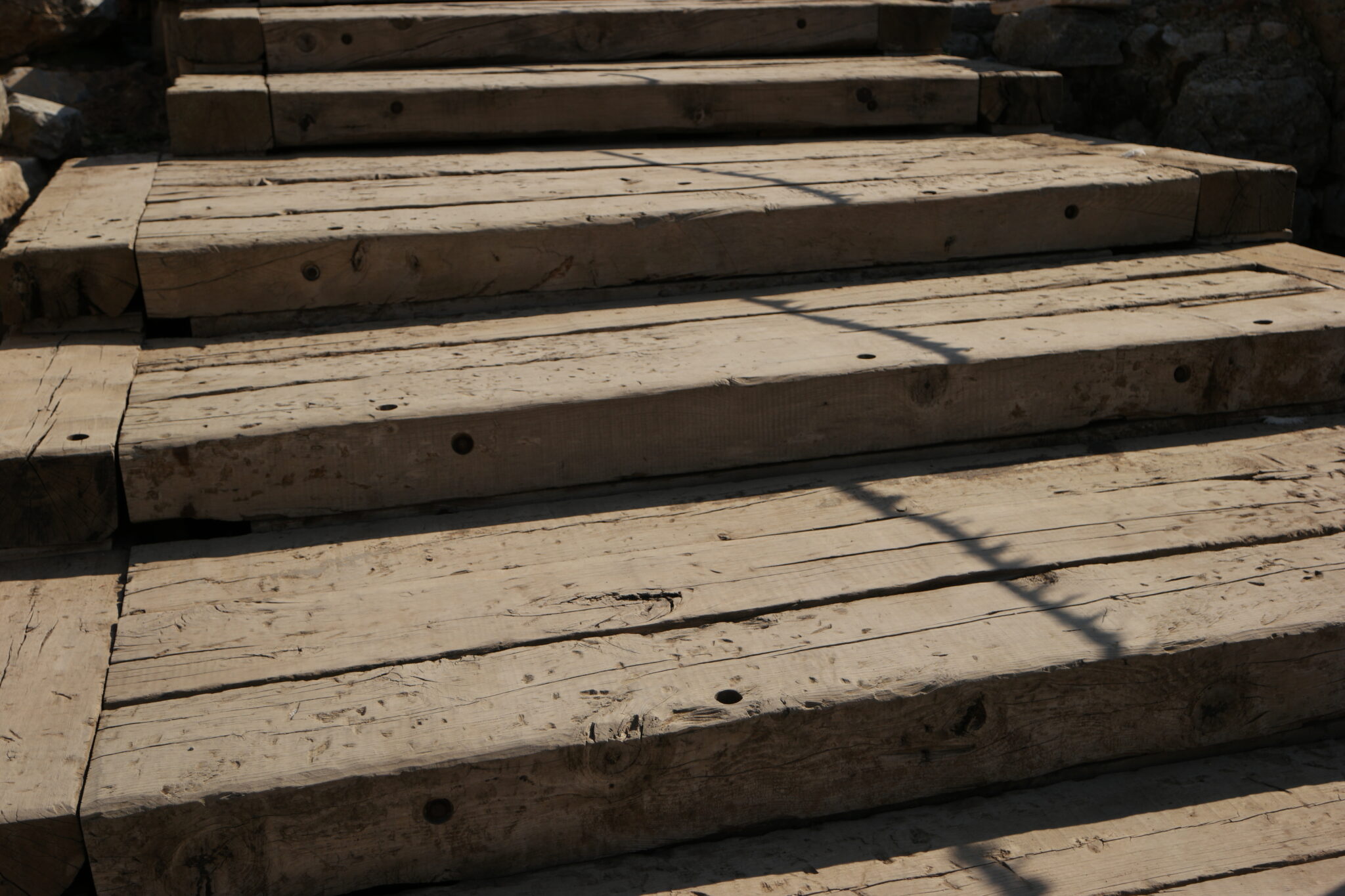 close-up-view-of-wooden-stairs-or-steps-outdoors-2022-01-28-10-03-13-utc-2048x1365